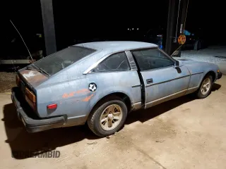 1979 Datsun 280ZX z VIN HGS130119790, wystawiony jako Copart lot #41504935 z przebiegiem 36 796 mil mil oraz Tytuł czysty. Historia ofert i sprzedaży dostępna na DreamBid. Obrazek 3.