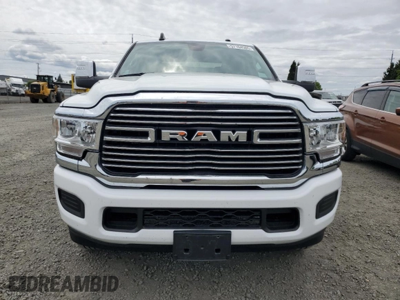 2023 Ram 2500 Laramie with VIN 3C6UR5FJ1PG634158, listed as a Copart auction lot 57164505 with 18,279 mi miles and Salvage title. Bid and sale history available at DreamBid. Image 5.