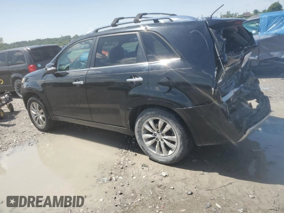 2012 Kia Sorento SX z VIN 5XYKW4A28CG193611, wystawiony jako Copart lot #57659935 z przebiegiem 203 349 mil mil oraz Szkoda całkowita • Salvage title. Historia ofert i sprzedaży dostępna na DreamBid. Obrazek 2.