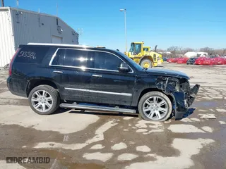 2017 Cadillac Escalade Premium Luxury with VIN 1GYS4CKJXHR133970, listed as a IAAI auction lot 41666038 with 100,269 mi miles. Bid and sale history available at carsss.com. Image 13.