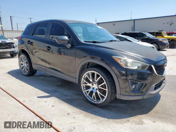 2014 Mazda CX-5 Touring with VIN JM3KE2CY5E0316077, listed as a Copart auction lot 58218735 with 190,789 mi miles and Salvage title. Bid and sale history available at DreamBid. Image 4.