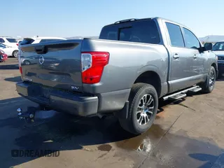 2021 Nissan Titan SV with VIN 1N6AA1EF2MN504611, listed as a IAAI auction lot 41469990 with 81,432 mi miles and . Bid and sale history available at DreamBid. Image 4.