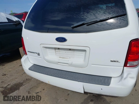 2006 Ford Freestar SEL z VIN 2FMZA52276BA05540, wystawiony jako IAAI lot #42001101 z przebiegiem Nie podano mil oraz . Historia ofert i sprzedaży dostępna na DreamBid. Obrazek 6.