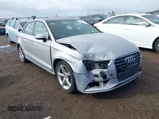 2016 Audi A3 Premium z VIN WAUA7GFF7G1070925, wystawiony jako IAAI lot #41733637 z przebiegiem 104 885 mil mil oraz . Historia ofert i sprzedaży dostępna na DreamBid. Obrazek 1.