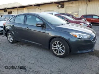 2017 Ford Focus SE z VIN 1FADP3F25HL331714, wystawiony jako Copart lot #77389764 z przebiegiem 49 953 mil mil oraz Szkoda całkowita • Salvage title. Historia ofert i sprzedaży dostępna na DreamBid. Obrazek 4.