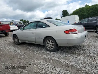 2000 Toyota Solara SE z VIN 2T1CG22P4YC340204, wystawiony jako Copart lot #56932265 z przebiegiem 168 041 mil mil oraz Czysty tytuł • Clean title. Historia ofert i sprzedaży dostępna na DreamBid. Obrazek 2.