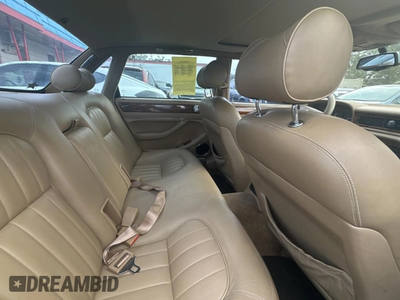 1995 Jaguar XJ with VIN SAJHX174XSC738291, listed as a Copart auction lot 87054224 with 71,076 mi miles and Clean title. Bid and sale history available at DreamBid. Image 6.