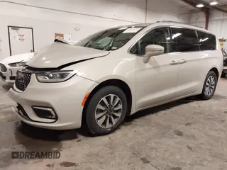 2021 Chrysler Pacifica Touring L with VIN 2C4RC1BG7MR531772, listed as a IAAI auction lot 41834392 with 156,123 mi miles and . Bid and sale history available at DreamBid. Image 21.