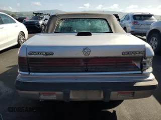 1992 Chrysler LeBaron z VIN 1C3X44539NF136763, wystawiony jako Copart lot #51253645 z przebiegiem 73 364 mil mil oraz Czysty tytuł • Clean title. Historia ofert i sprzedaży dostępna na DreamBid. Obrazek 6.