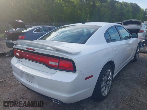 2014 Dodge Charger SXT with VIN 2C3CDXHG4EH337807, listed as a IAAI auction lot 42027319 with 151,988 mi miles. Bid and sale history available at carsss.com. Image 4.