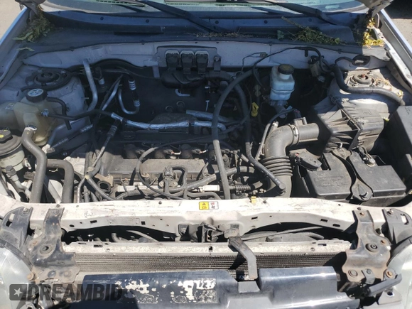 2005 Ford Escape XLS Value with VIN 1FMYU92Z55KC93604, listed as a Copart auction lot 60104145 with 86,788 mi miles and Salvage title. Bid and sale history available at DreamBid. Image 12.