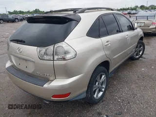 2006 Lexus RX 400h with VIN JTJHW31U060004642, listed as a IAAI auction lot 42207589 with 158,506 mi miles and . Bid and sale history available at DreamBid. Image 4.