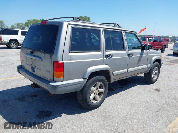 2001 Jeep Cherokee Sport with VIN 1J4FF48SX1L568532, listed as a IAAI auction lot 42738398 with 281,001 mi miles and . Bid and sale history available at DreamBid. Image 4.
