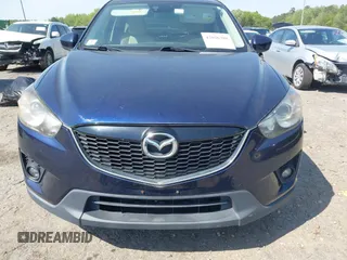 2014 Mazda CX-5 Grand Touring with VIN JM3KE4DYXE0342720, listed as a IAAI auction lot 42026388 with 114,072 mi miles and . Bid and sale history available at carsss.com. Image 13.