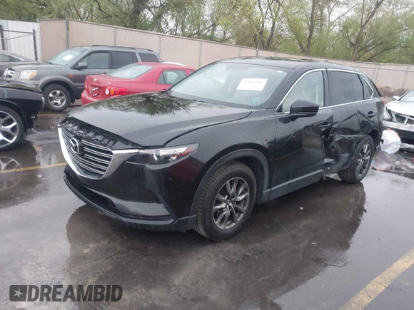 2016 Mazda CX-9 Touring with VIN JM3TCBCY5G0101490, listed as a IAAI auction lot 42062846 with 85,352 mi miles and . Bid and sale history available at DreamBid. Image 17.
