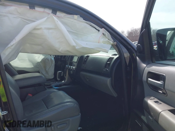 2016 Toyota Sequoia Limited with VIN 5TDJY5G14GS143565, listed as a IAAI auction lot 41823068 with 144,566 mi miles. Bid and sale history available at carsss.com. Image 5.