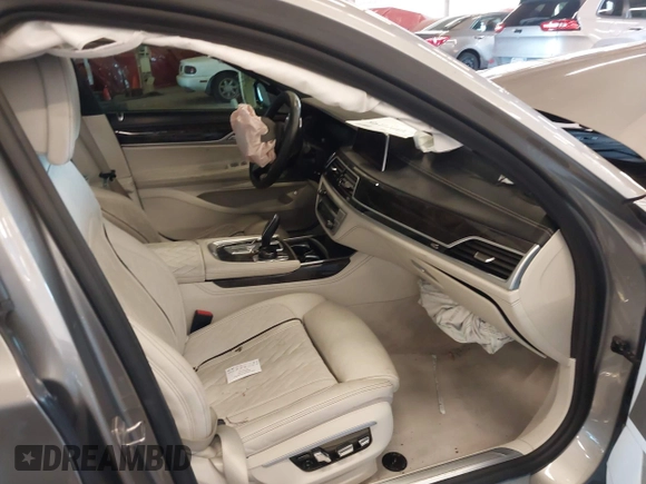 2020 BMW 7 Series 750i xDrive with VIN WBA7U2C07LGJ59164, listed as a IAAI auction lot 42001056 with Not provided miles and . Bid and sale history available at DreamBid. Image 5.