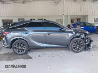 2024 Lexus RX 350 z VIN 2T2BAMCA8RC055389, wystawiony jako IAAI lot #42146492 z przebiegiem 18 002 mil mil oraz . Historia ofert i sprzedaży dostępna na DreamBid. Obrazek 13.
