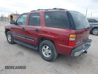 2001 Chevrolet Tahoe LS with VIN 1GNEK13T81J242596, listed as a IAAI auction lot 42177221 with 172,971 mi miles. Bid and sale history available at carsss.com. Image 3.