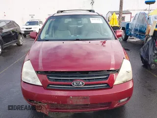 2006 Kia Sedona LX with VIN KNDMB233X66030979, listed as a IAAI auction lot 41933430 with 127,305 mi miles and . Bid and sale history available at DreamBid. Image 6.
