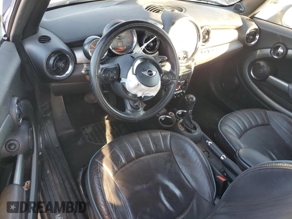 2015 MINI Convertible with VIN WMWZN3C53FT862859, listed as a Copart auction lot 71419764 with 113,356 mi miles and Salvage title. Bid and sale history available at DreamBid. Image 8.