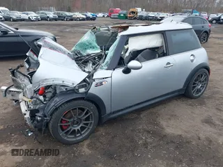 2006 MINI Hardtop S with VIN WMWRE33546TL23876, listed as a IAAI auction lot 41858060 with 146,359 mi miles and . Bid and sale history available at DreamBid. Image 18.