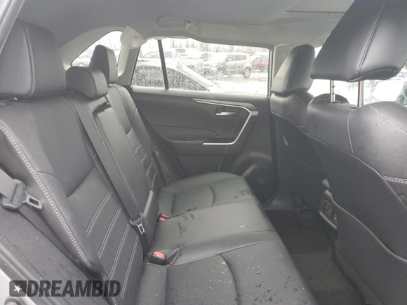 2024 Toyota RAV4 Hybrid XLE Premium with VIN 2T3B6RFV6RW066043, listed as a Copart auction lot 43470115 with 9,454 mi miles and Salvage Title. Bid and sale history available at DreamBid. Image 10.