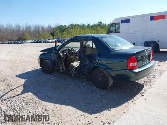 2001 Mazda Protege LX with VIN JM1BJ225310404647, listed as a IAAI auction lot 41480466 with 115,606 mi miles and . Bid and sale history available at carsss.com. Image 3.