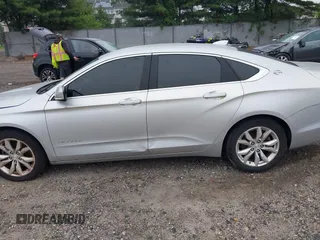 2018 Chevrolet Impala LT with VIN 1G1105S39JU135456, listed as a IAAI auction lot 42360696 with 124,176 mi miles and . Bid and sale history available at DreamBid. Image 13.