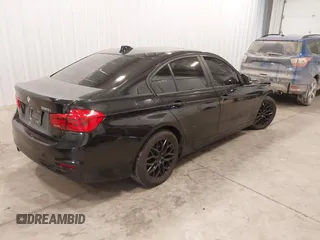 2018 BMW 3 Series 320i xDrive with VIN WBA8E5G5XJNU46855, listed as a IAAI auction lot 41526290 with 68,720 mi miles. Bid and sale history available at carsss.com. Image 4.