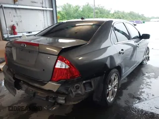 2012 Ford Fusion SE with VIN 3FAHP0HA8CR407618, listed as a IAAI auction lot 42199709 with 124,924 mi miles and . Bid and sale history available at DreamBid. Image 4.