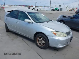 2004 Toyota Camry LE with VIN 4T1BE32K24U866058, listed as a IAAI auction lot 42094444 with 279,074 mi miles. Bid and sale history available at carsss.com. Image 1.