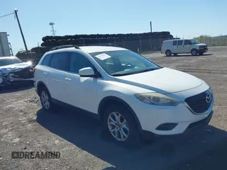 2015 Mazda CX-9 Touring with VIN JM3TB3CV1F0461403, listed as a IAAI auction lot 42148325 with 143,452 mi miles. Bid and sale history available at carsss.com. Image 1.
