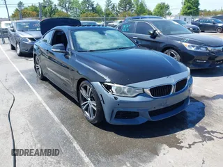 2015 BMW 4 Series 435i with VIN WBA3R1C56FK194060, listed as a IAAI auction lot 42061619 with 153,384 mi miles and . Bid and sale history available at DreamBid. Image 1.