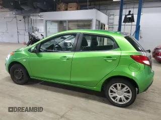 2012 Mazda 2 Sport with VIN JM1DE1KY9C0151578, listed as a Copart auction lot 52625055 with 123,812 mi miles and Salvage Title. Bid and sale history available at DreamBid. Image 2.