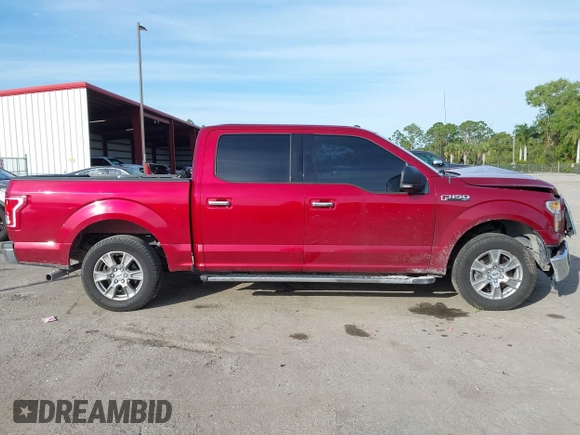 2015 Ford F-150 XLT with VIN 1FTEW1C87FKD70547, listed as a IAAI auction lot 41451841 with 151,596 mi miles and . Bid and sale history available at carsss.com. Image 14.