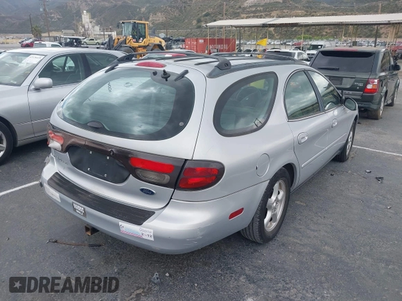 2002 Ford Taurus SE Standard with VIN 1FAFP58U82G227382, listed as a IAAI auction lot 41670977 with 66,354 mi miles. Bid and sale history available at carsss.com. Image 4.