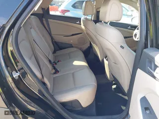 2017 Hyundai Tucson Value with VIN KM8J33A25HU586191, listed as a IAAI auction lot 41682127 with 58,877 mi miles. Bid and sale history available at carsss.com. Image 8.