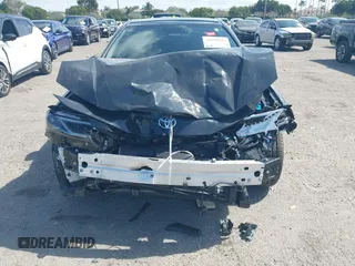 2025 Toyota Camry LE with VIN 4T1DAACK5SU076886, listed as a IAAI auction lot 41629641 with 9,919 mi miles and . Bid and sale history available at DreamBid. Image 13.