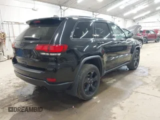 2021 Jeep Grand Cherokee Laredo X with VIN 1C4RJFAG5MC817567, listed as a IAAI auction lot 42297526 with 71,387 mi miles and . Bid and sale history available at DreamBid. Image 4.