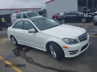 2014 Mercedes-Benz C-Class C 250 Sport with VIN WDDGF4HB5EA964157, listed as a IAAI auction lot 41884091 with 114,274 mi miles. Bid and sale history available at carsss.com. Image 1.