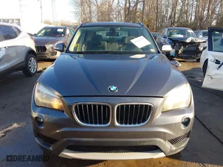 2014 BMW X1 sDrive28i with VIN WBAVM1C52EVW55890, listed as a IAAI auction lot 41512784 with 97,718 mi miles. Bid and sale history available at carsss.com. Image 12.
