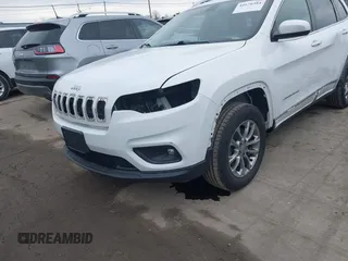 2019 Jeep Cherokee Latitude Plus with VIN 1C4PJMLB4KD213559, listed as a IAAI auction lot 41676384 with 120,562 mi miles and . Bid and sale history available at DreamBid. Image 6.