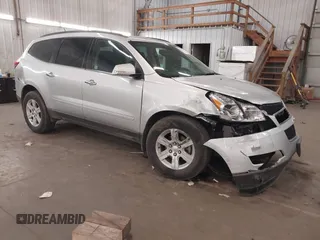 2011 Chevrolet Traverse 1LT with VIN 1GNKVGEDXBJ290086, listed as a IAAI auction lot 41807384 with 85,173 mi miles and . Bid and sale history available at DreamBid. Image 1.
