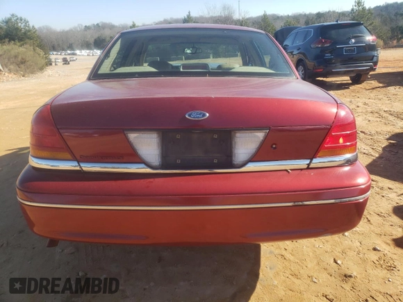 1998 Ford Crown Victoria LX с VIN 2FAFP74W3WX138757, выставлен на аукционе Copart как лот 87867945 с пробегом 148 827 миль миль и Списание • Salvage title. История ставок и продаж доступна на DreamBid. Изображение 6.
