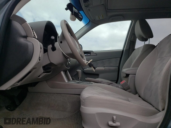 2010 Subaru Forester X Premium with VIN JF2SH6CCXAH736488, listed as a Copart auction lot 61040815 with 61,823 mi miles and Salvage title. Bid and sale history available at DreamBid. Image 7.