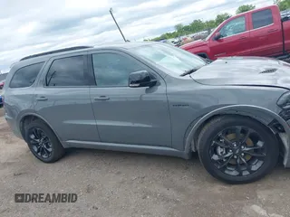 2023 Dodge Durango R/T with VIN 1C4SDJCT5PC551011, listed as a IAAI auction lot 42336477 with 39,754 mi miles and . Bid and sale history available at DreamBid. Image 13.