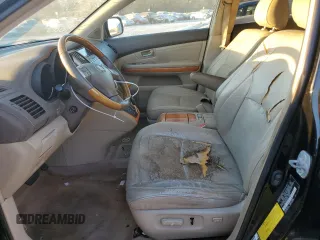 2007 Lexus RX 350 z VIN 2T2GK31U07C003715, wystawiony jako Copart lot #77165994 z przebiegiem 206 083 mil mil oraz Czysty tytuł • Clean title. Historia ofert i sprzedaży dostępna na DreamBid. Obrazek 7.