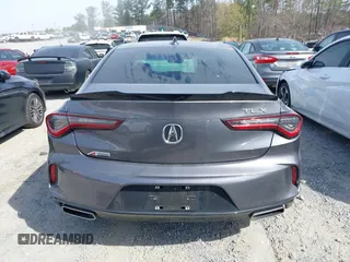 2022 Acura TLX w/A-Spec Package z VIN 19UUB5F53NA002629, wystawiony jako IAAI lot #41836622 z przebiegiem 51 815 mil mil oraz . Historia ofert i sprzedaży dostępna na DreamBid. Obrazek 16.