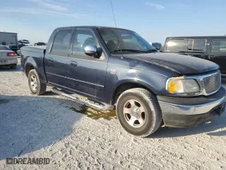 2001 Ford F-150 SuperCrew XLT with VIN 1FTRW07W41KE36887, listed as a Copart auction lot 76418694 with 280,470 mi miles and Salvage Title. Bid and sale history available at carsss.com. Image 4.